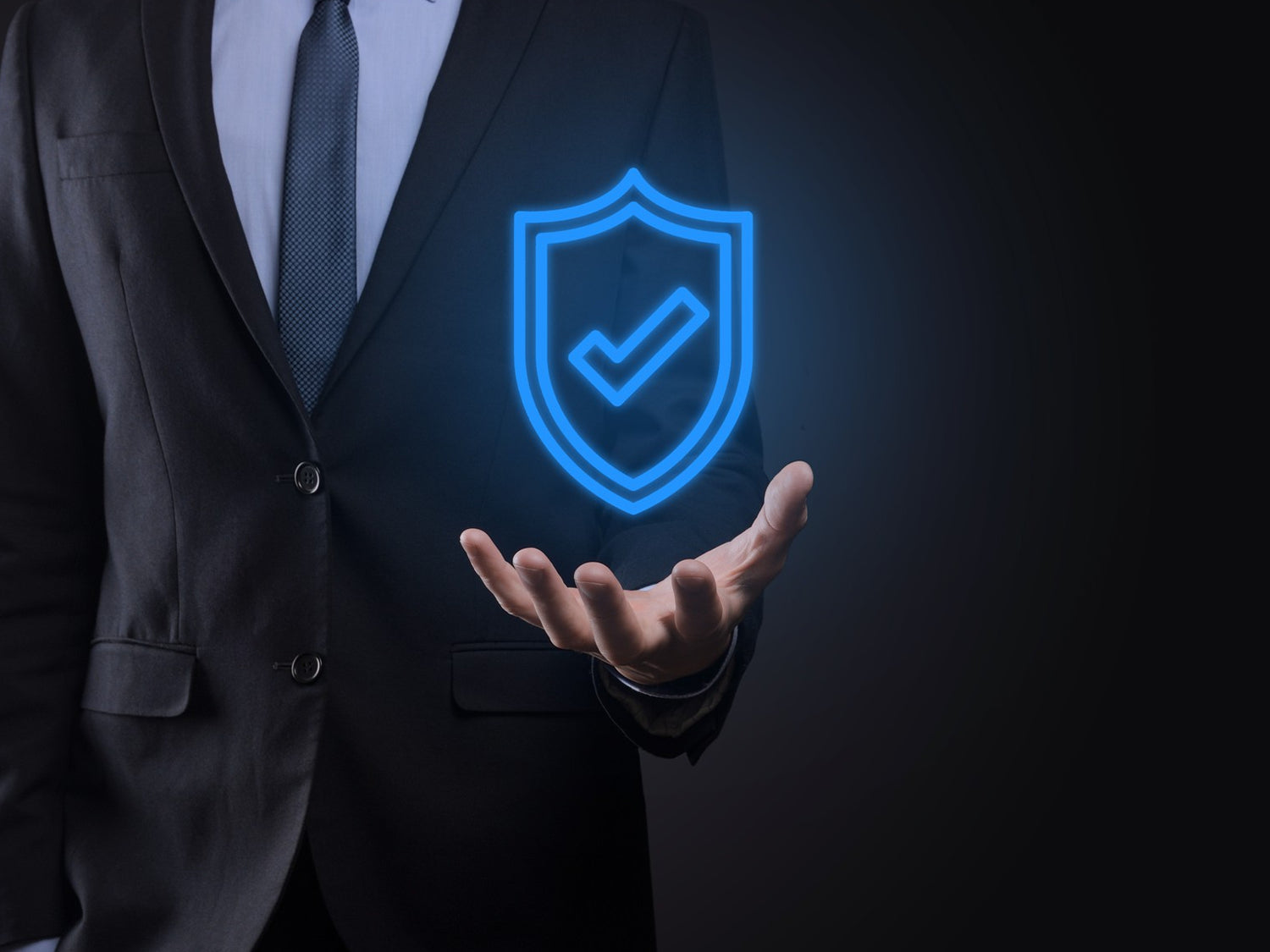 A businessman in a suit holds his hand open, from which a glowing blue shield with a checkmark emerges, symbolizing a trusted product warranty.
